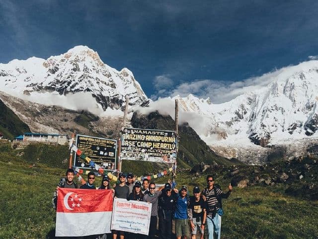 Sunrise Adventure Trek team and client at annapurna base camp